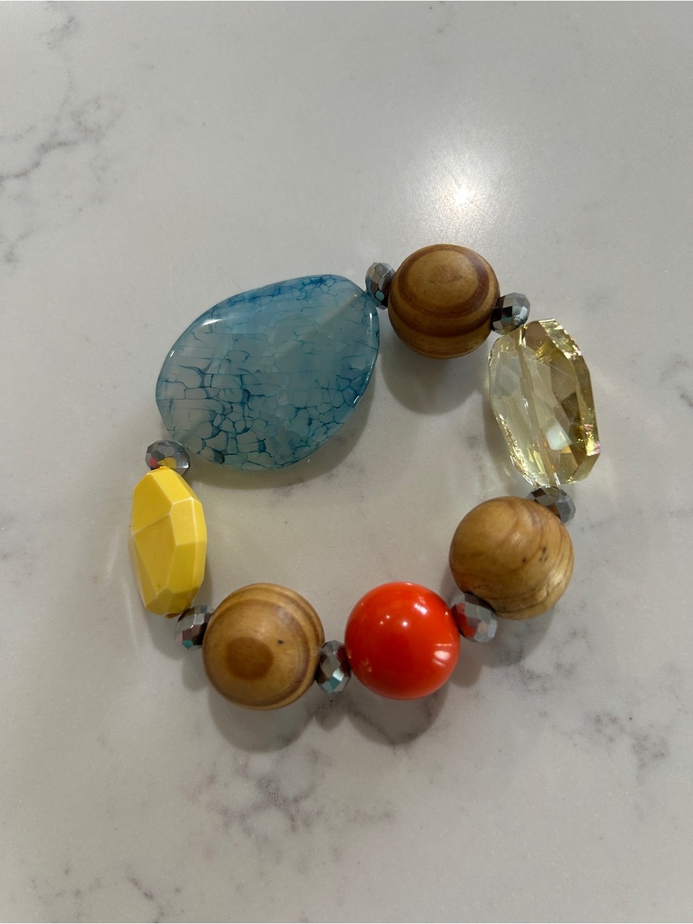Multi-Color Beaded Stretch Bracelet with Blue Teardrop Pendant